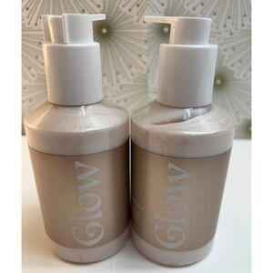 Two 11 ounce bottles of World Market's Amber Vanilla Shimmering Body Lotion